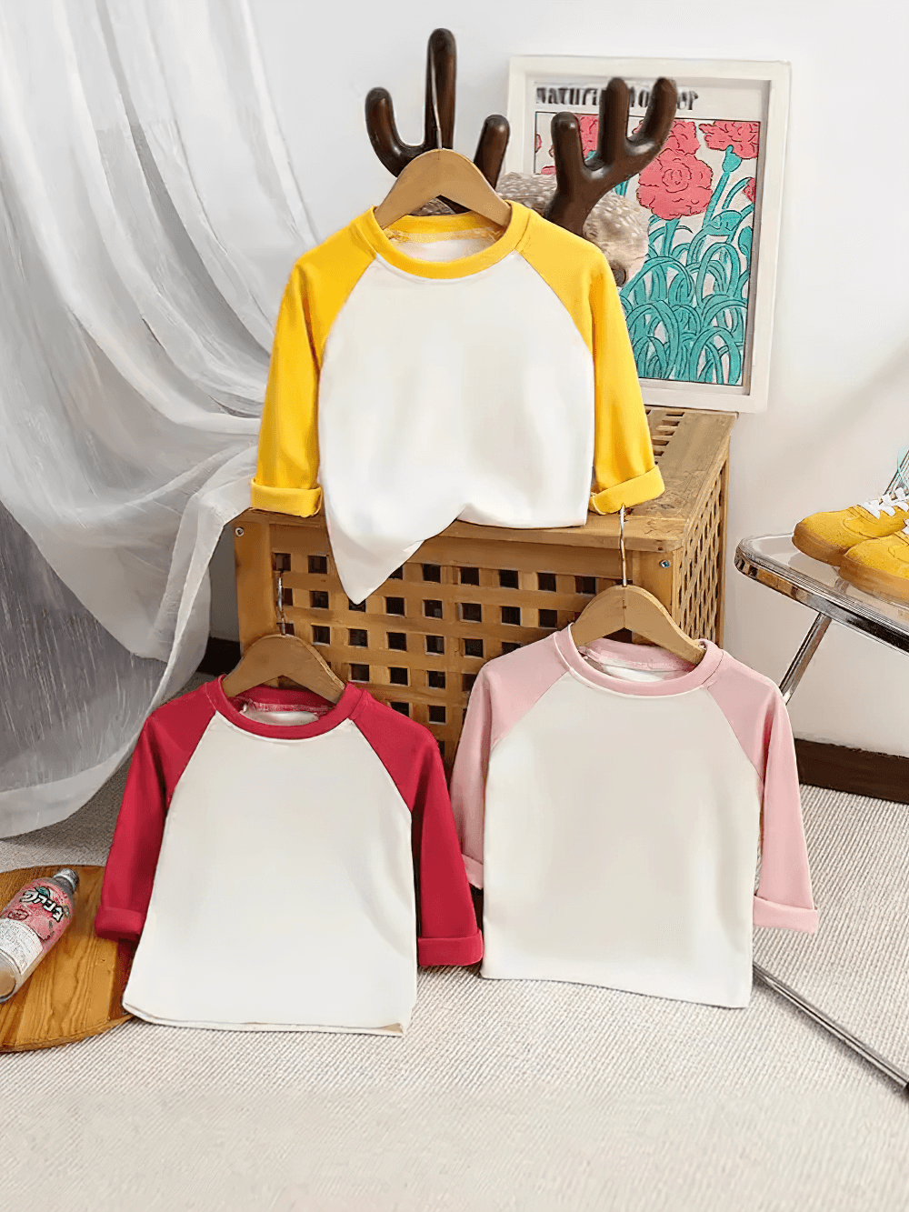 Adorable kids' tops with raglan sleeves and a round neck in yellow, red, and pink. Perfect for playful days! SF3099